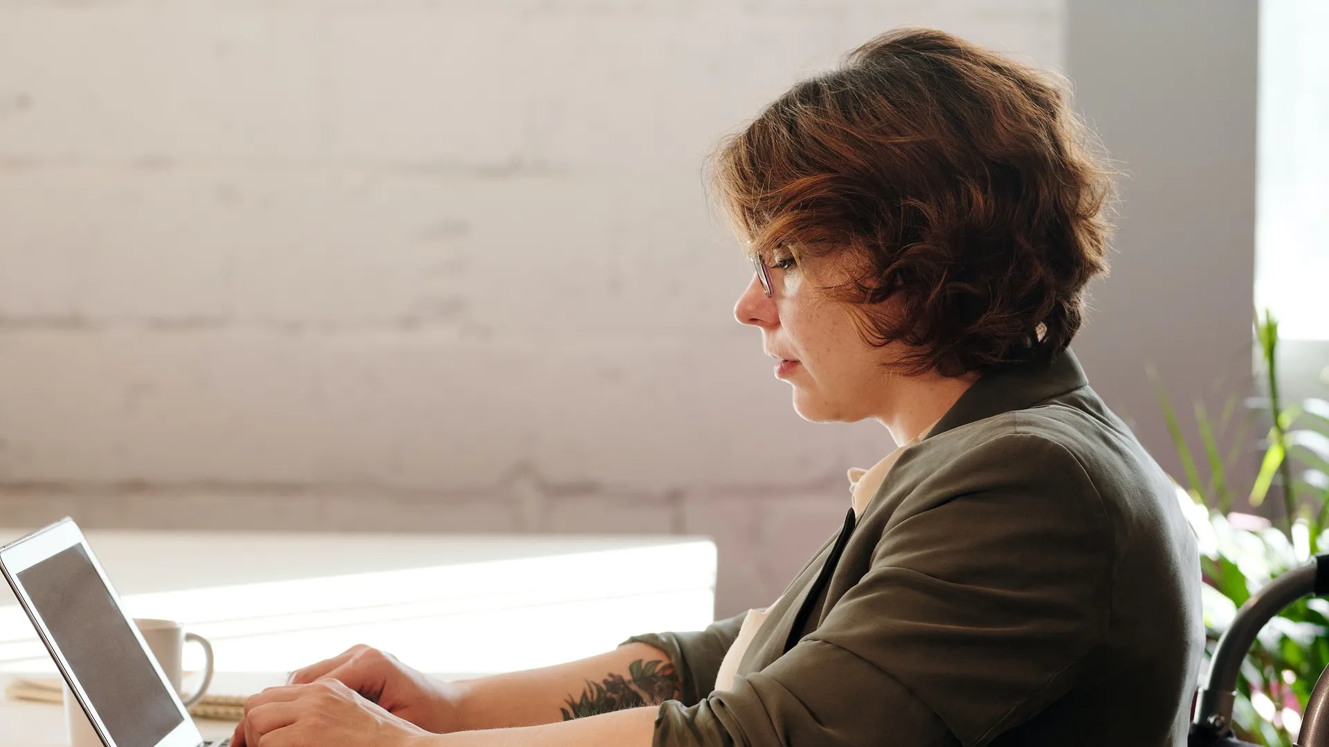 woman-using-macbook-air-4064175