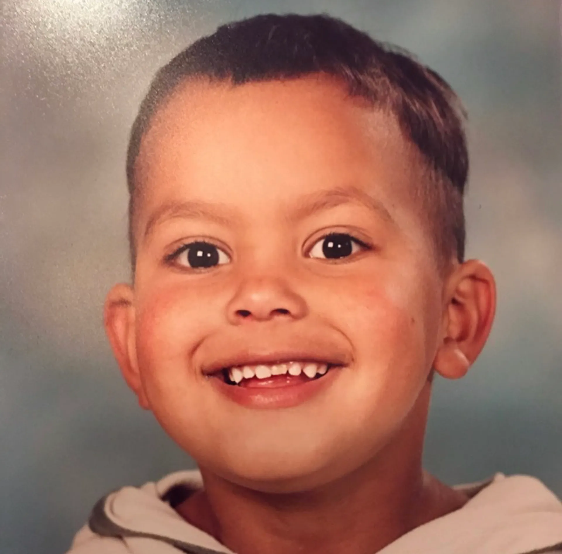 Jamaal als kind op de schoolfoto