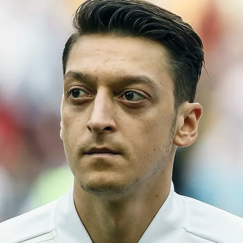 Özil, ga eens praten met Churandy Martina